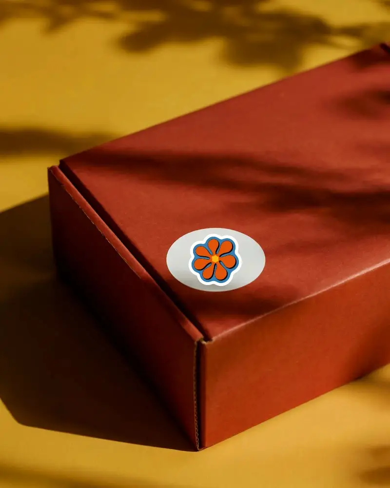 White Round Sticker Mockup On Craft Paper Box For Custom Label And Packaging Presentation