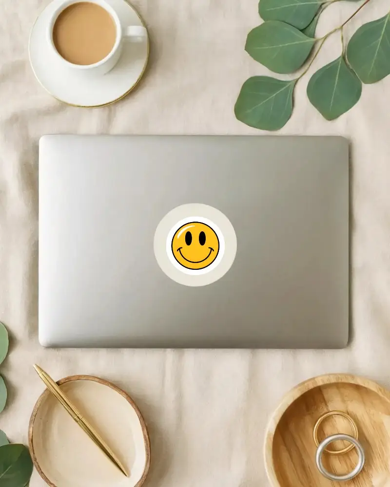 Minimalistic Round Laptop Sticker Mockup On Neutral Fabric Backdrop With Accessories