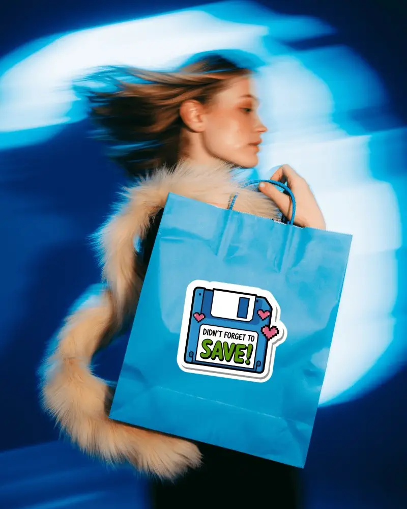 Sticker Mockups Fashion Model In Motion Holding Blue Shopping Bag With Dynamic Light Trails