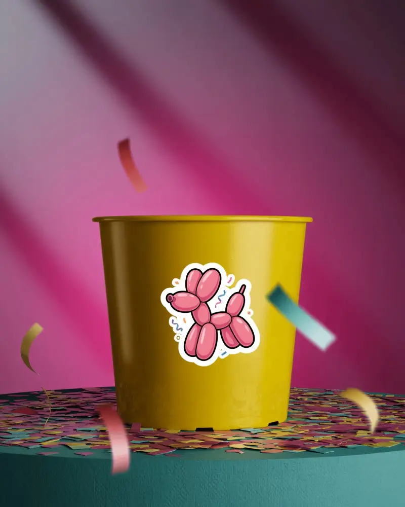 Sticker Mockups Colorful Paper Cup On Confetti Platform With Vibrant Pink And Falling Streamers