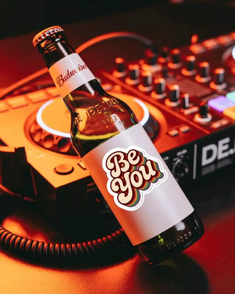 Sticker Mockups Beer Bottle Label On Dj Mixer Console With Nightclub Lighting And Music Vibe