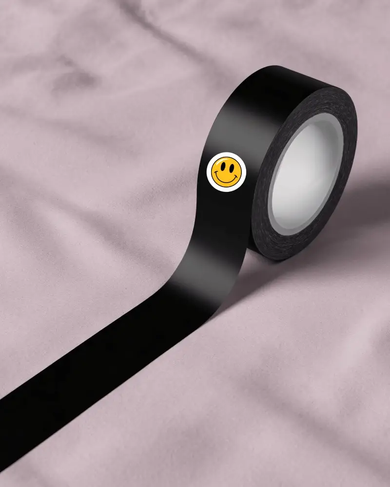 Vinyl Adhesive Sticker Tape Roll Mockup Placed On Textured Cloth Surface Product Display