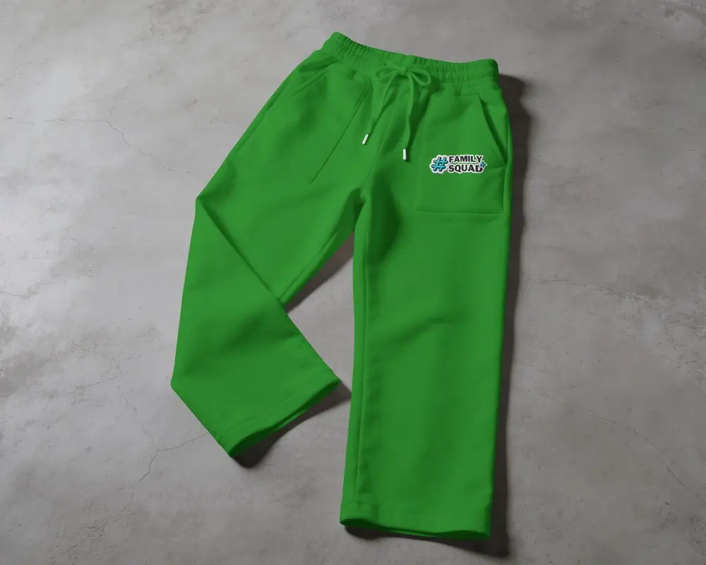 Minimal Flat Lay Sweatpants Mockup On Concrete Floor With Drawstring Waist And One Leg Folded