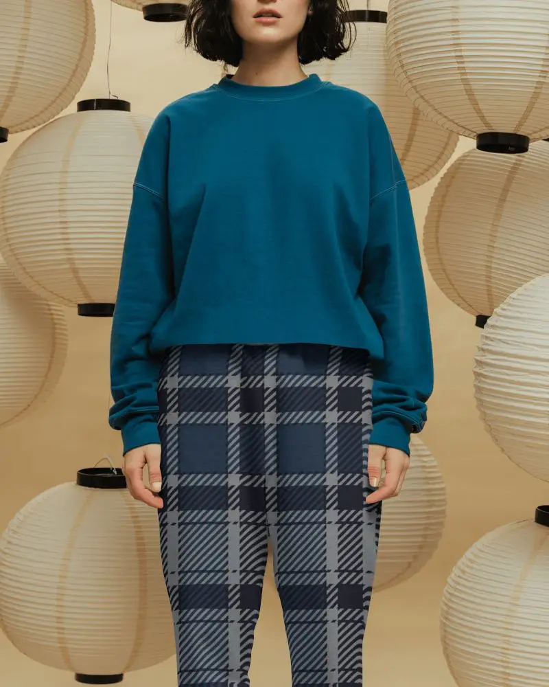 Modern Sweatpants Mockup Warm Lantern Backdrop With Soft Studio Lighting