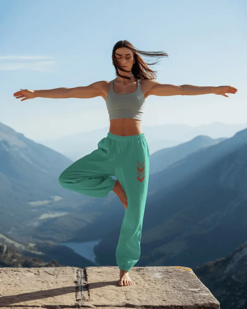 Mountain Peak Sweatpants Mockup Yoga Pose On Cliff With Scenic Valley View Morning Light