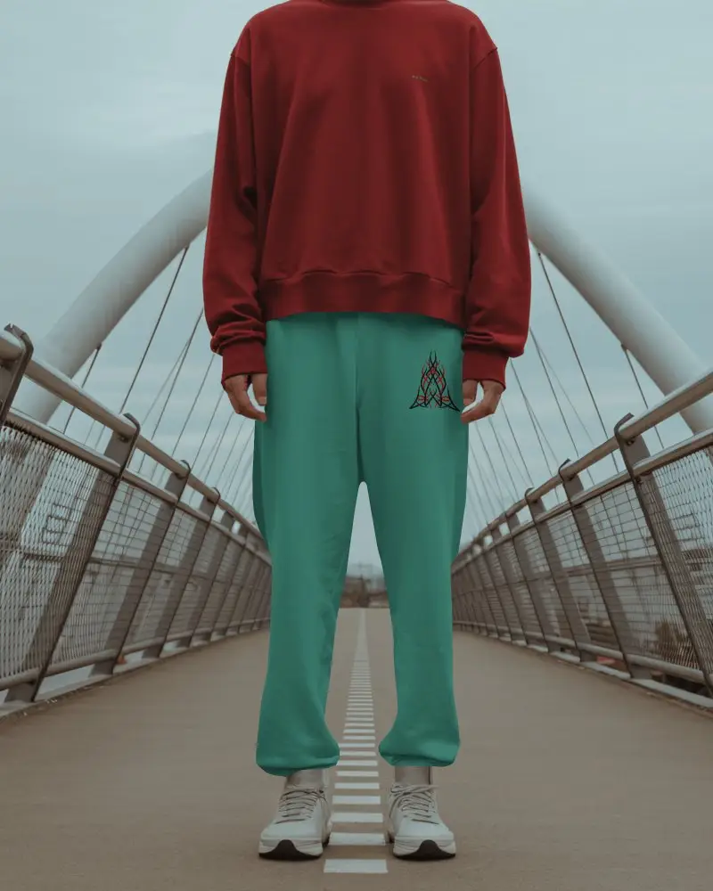 Urban Bridge Sweatpants Mockup Relaxed Model Standing Centered On Modern Arched Walkway