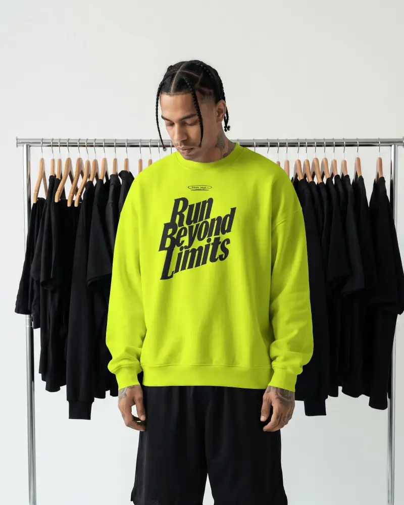 Clothing Rack Studio Sweatshirt Mockup Male Model Wearing Crewneck In Minimal Fashion Showroom