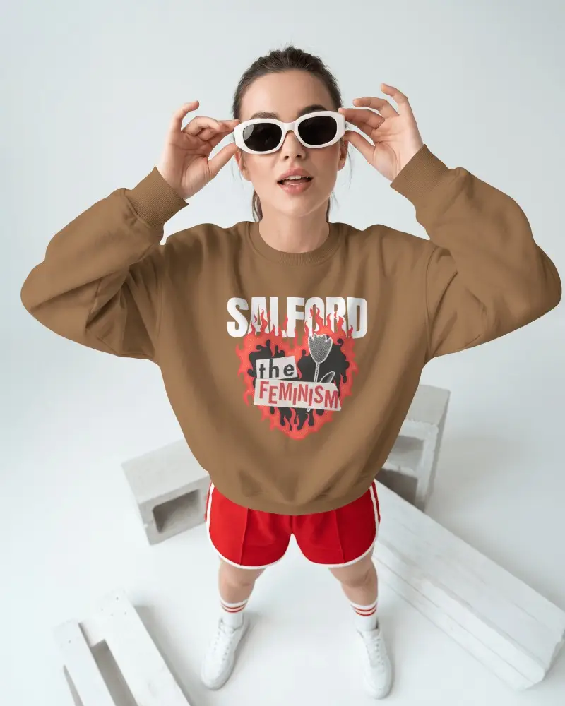 High Angle Sweatshirt Mockup Female Model Adjusting White Sunglasses In Clean Minimal Studio