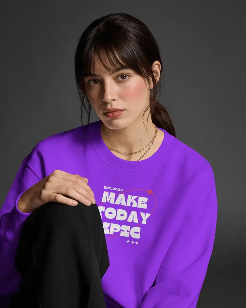 Portrait Sweatshirt Mockup Female Model Seated Against Dark Gray Studio Background