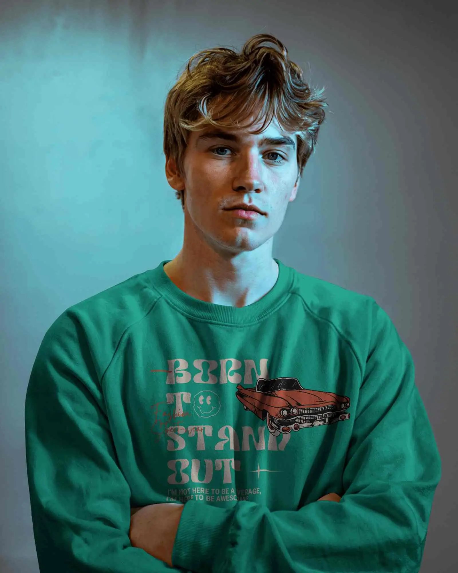 Moody Studio Sweatshirt Mockup Male Model In Crewneck With Crossed Arms And Colored Lighting Edgy And Artistic Vibe