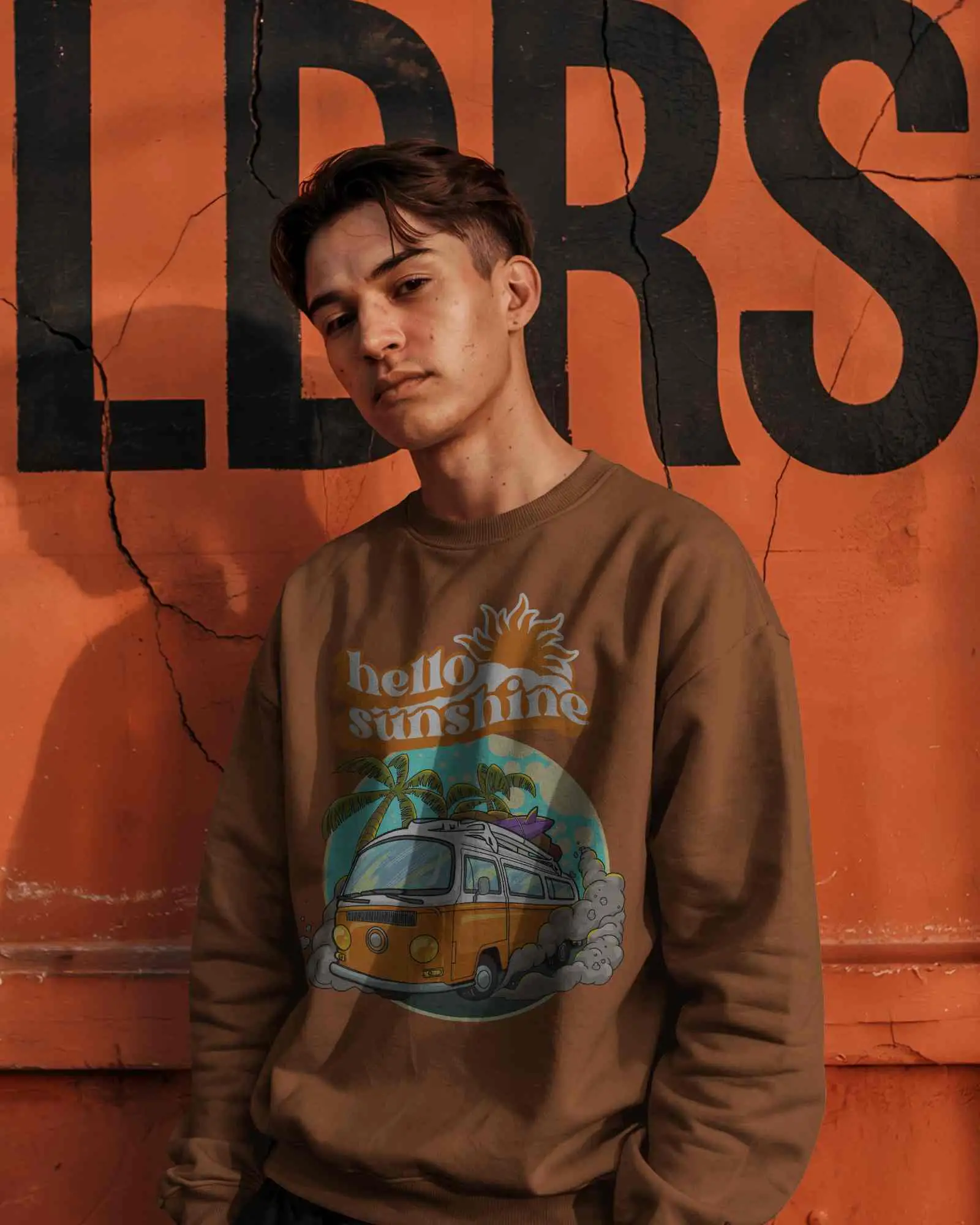 Urban Wall Sweatshirt Mockup Male Model In Grey Crewneck Standing Against Cracked Orange Mural Bold Edgy Vibe