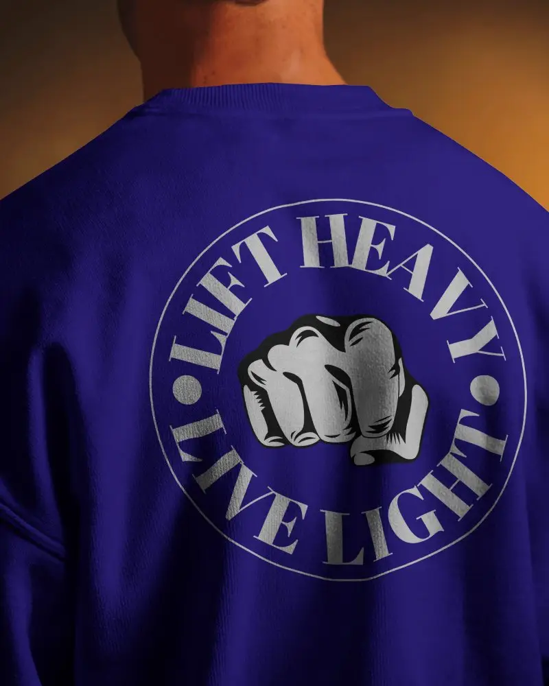 Dramatic Closeup Sweatshirt Mockup Back View Male Model Under Warm Spotlight Focus On Texture And Print Bold Light Shadow Contrast