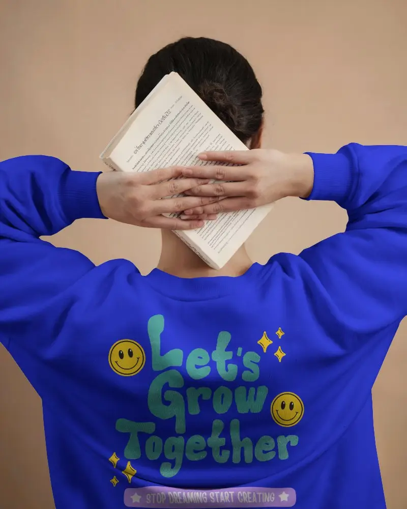 Back View White Sweatshirt Mockup Female Model Holding Book Overhead Minimalist Scene With Neutral Background