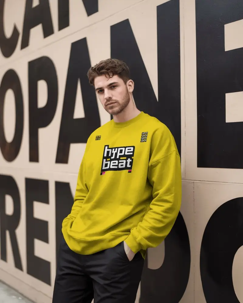 Urban Streetwear Sweatshirt Mockup Male Model Posing Against Bold Typography Wall Backdrop
