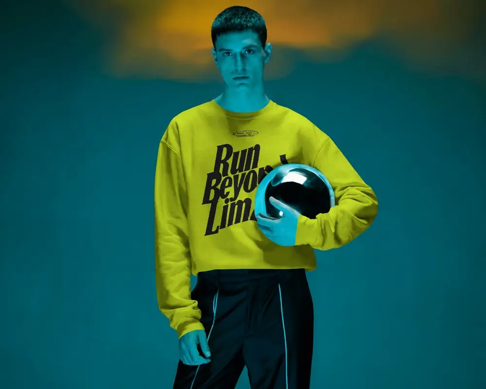 Cyber Inspire Sweatshirt Mockup Male Model With Metalic Sphere Minimal Stylish Contemporary Portrait