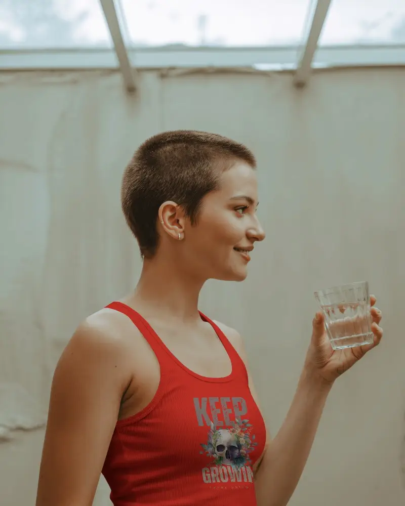 Female Model Wearing Stylish Tank Top Mockup For Athletic And Casual Outfit Promotion