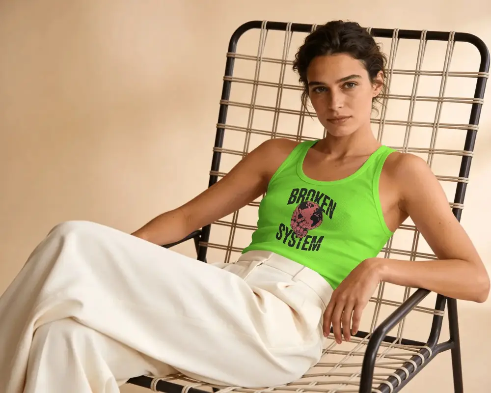 Comfortable Fitted Woman Tank Top Mockup With High Waist Trousers And Casual Seating Pose