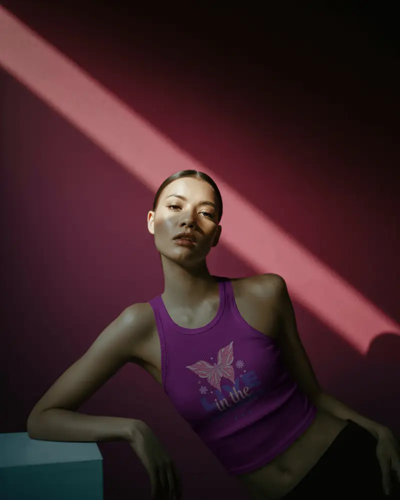 Cinematic Fashion Tank Top Mockup Female Model Under Spotlight With Deep Shadow And Purple Wall 063