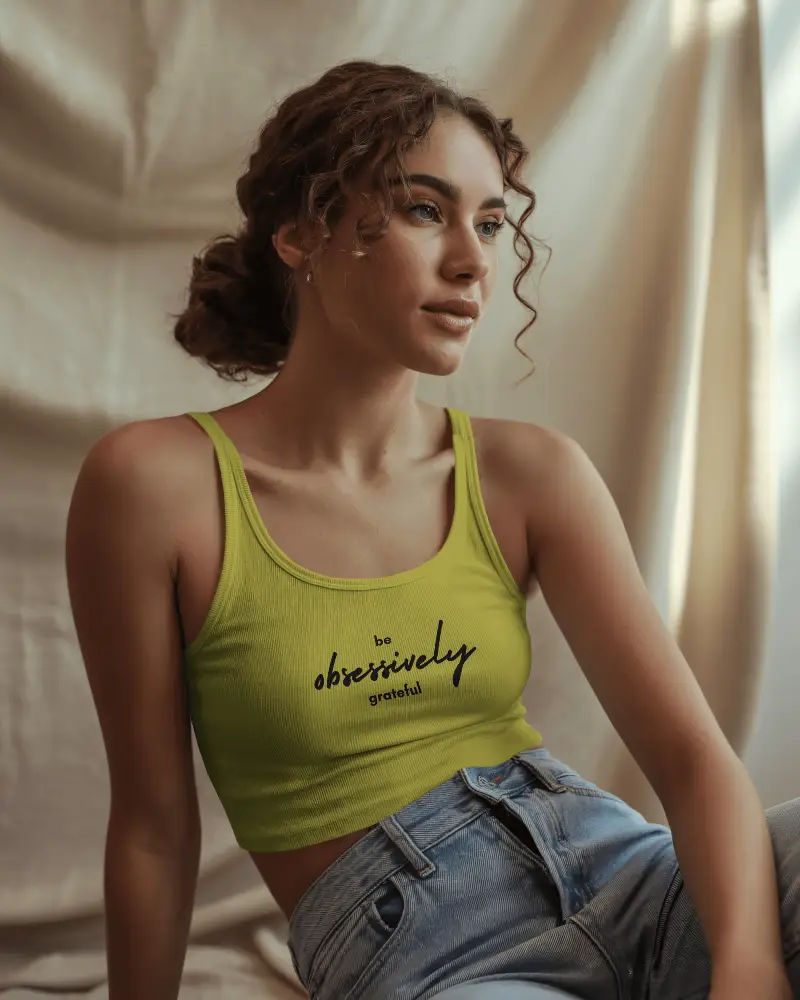 Cozy Lighting Tank Top Mockup Female Model Sitting Near Window With Cream Curtain And Soft Glow 071
