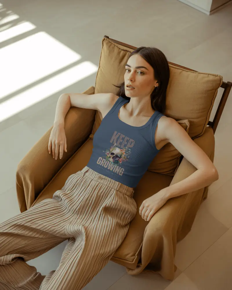 Relaxed Sunlit Tank Top Mockup Female Model Lying On Tan Chair In Modern Interior With Soft Shadows 072