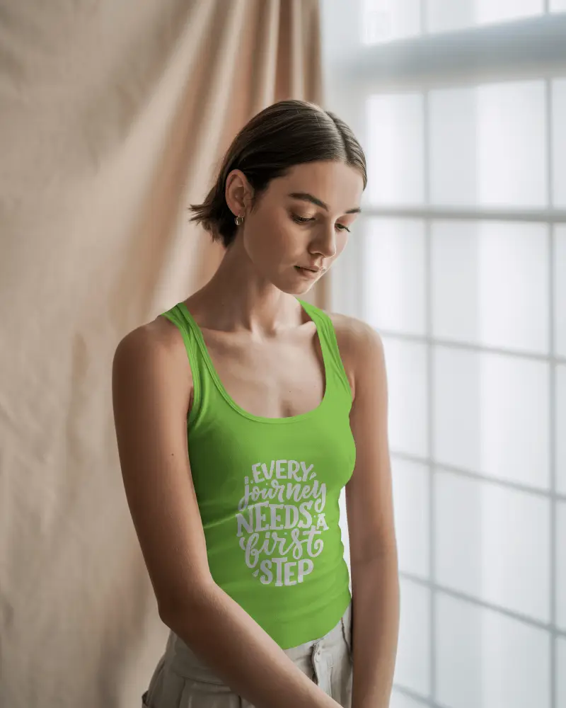 Sunlit Interior Tank Top Mockup Female Model Looking Down In Soft Window Light With Curtain Backdrop 067