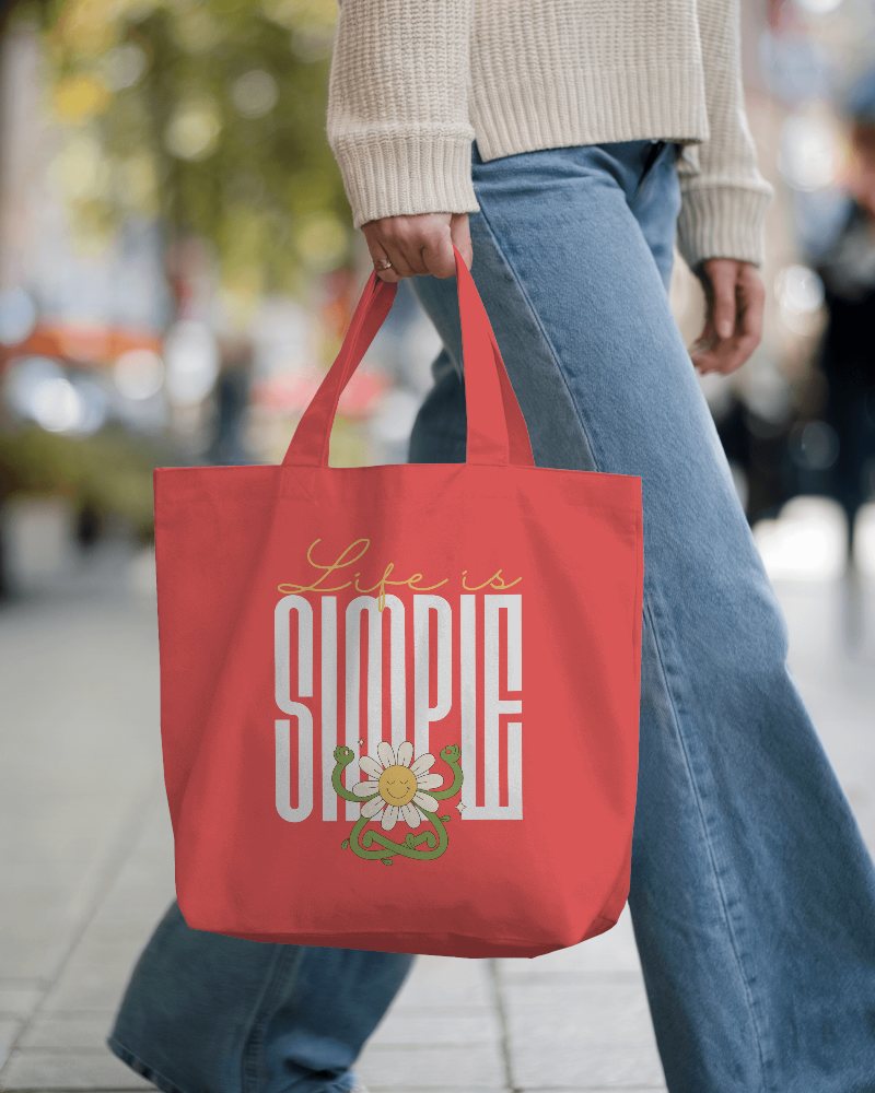 Urban Street Tote Bag Mockup Female Model In Casual Outfit Holding Canvas Bag On City Sidewalk Blurred Background And Natural Light 0148