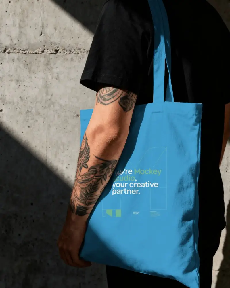 Blank Simple Fabric Tote Bag Mockup Showcasing Design On Models Arm For Advertising