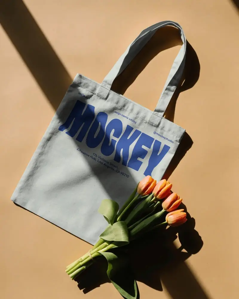 Eco Friendly Cotton Tote Bag Mockup With Bouquet Of Fresh Flowers For Design Display