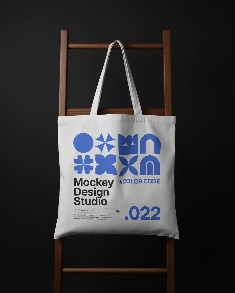 Minimalistic Tote Bag Mockup Draped Over Ladder Ideal For Branding And Marketing Use