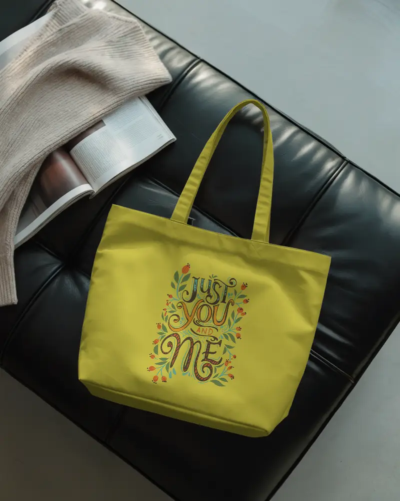 Relaxed Interior Tote Bag Mockup On Black Leather Seat With Open Magazine And Knitted Blanket 0294