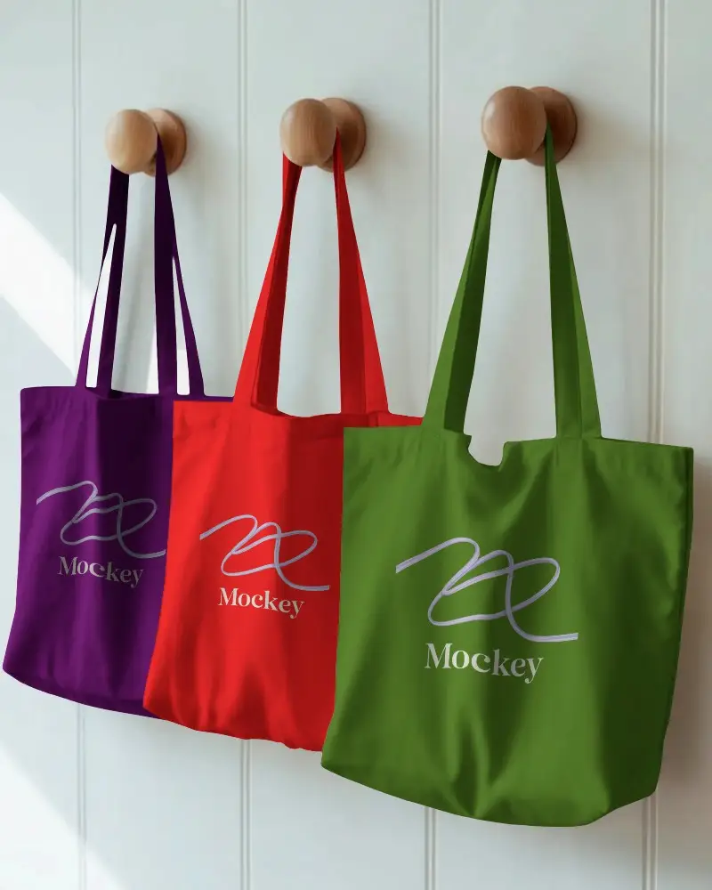 Three Set Cotton Tote Bags Mockup For Eco Friendly Shopping And Daily Use Hanging On Wall Hookss