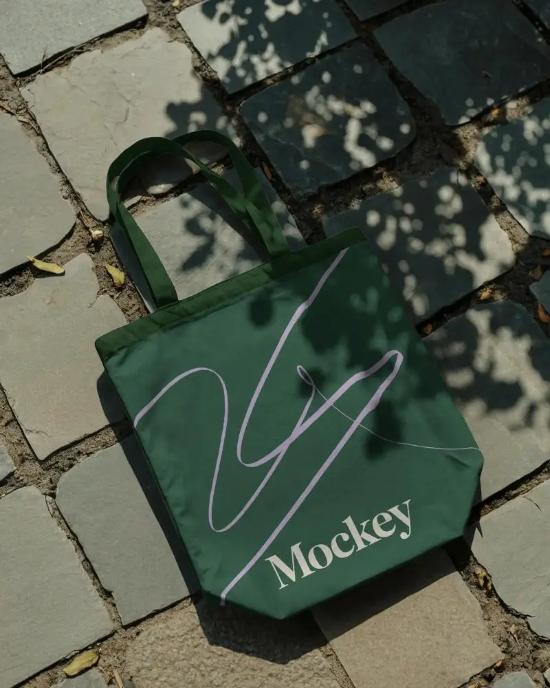 Rustic Stone Path Tote Bag Mockup Under Tree Shadows Natural Lighting Eco Friendly Fashion Style