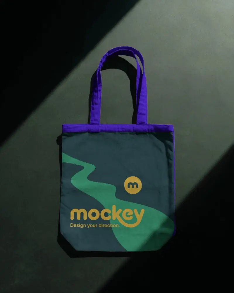 Sleek Tote Bag Mockup Under Studio Spotlight Clean Dark Background Minimal Elegant Branding