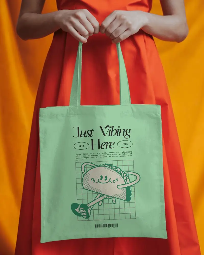 Elegant Handheld Tote Bag Mockup Woman In Red Dress Against Bright Orange Backdrop High Fashion Contrast Scene