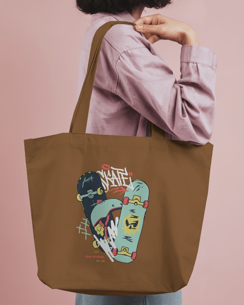 Tote Bag Mockup Held By Model Against Pink Background