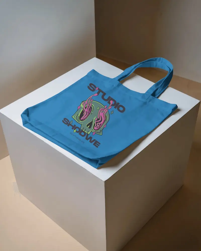 Modern Art Totebag Mockup Plain White Tote with editable design spot set against a backdrop of a sleek white podium in a minimalist room setting Clean and sophisticated feeling