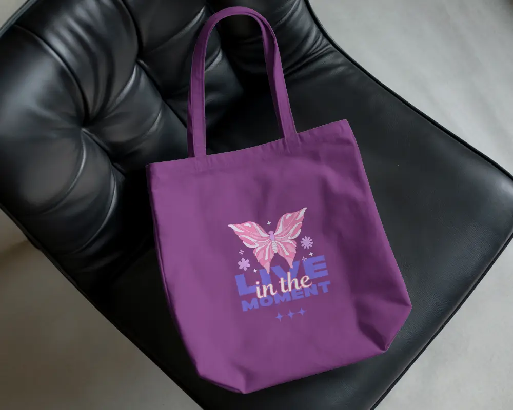 Modern Interior Tote Bag Mockup On Black Leather Chair With Natural Light And Soft Shadow 0291