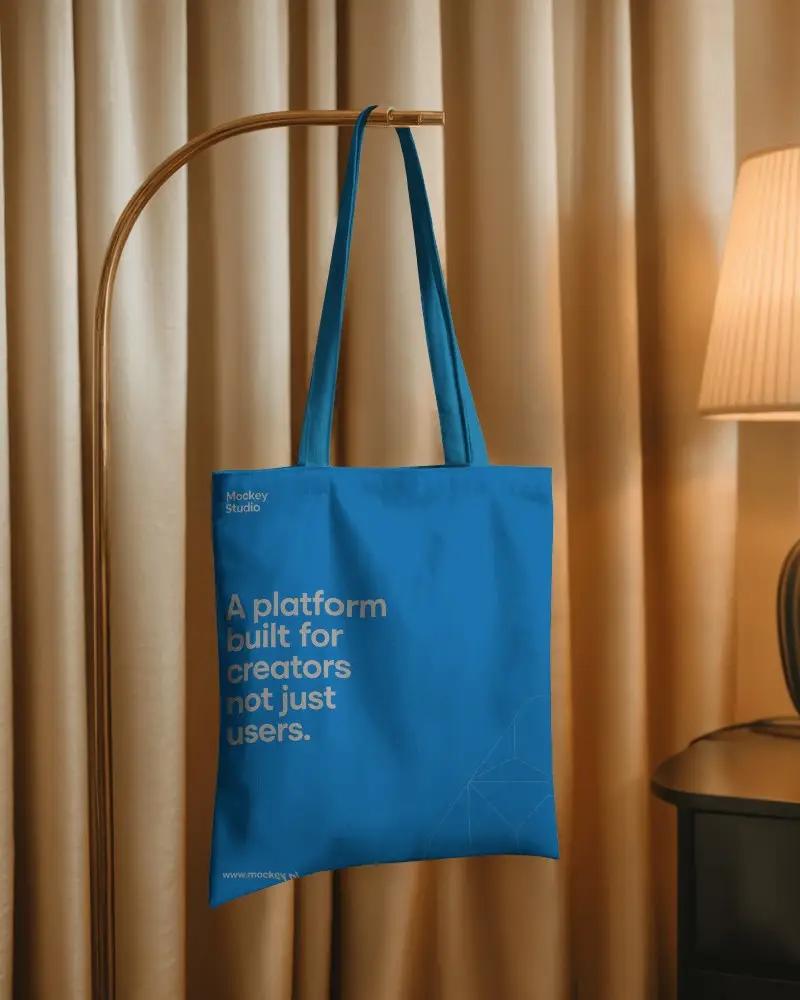 Elegant Indoor Tote Bag Mockup Hanging On Golden Stand With Beige Curtains And Soft Lamp Light 0309