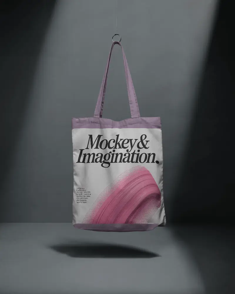 Hanging Cotton Tote Bag Mockup With Long Handles In Studio Background For Product Presentation