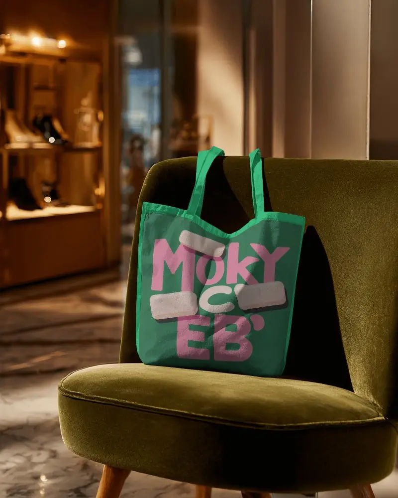 Minimalistic Tote Bag Mockup On Vintage Chair In High End Store Environment
