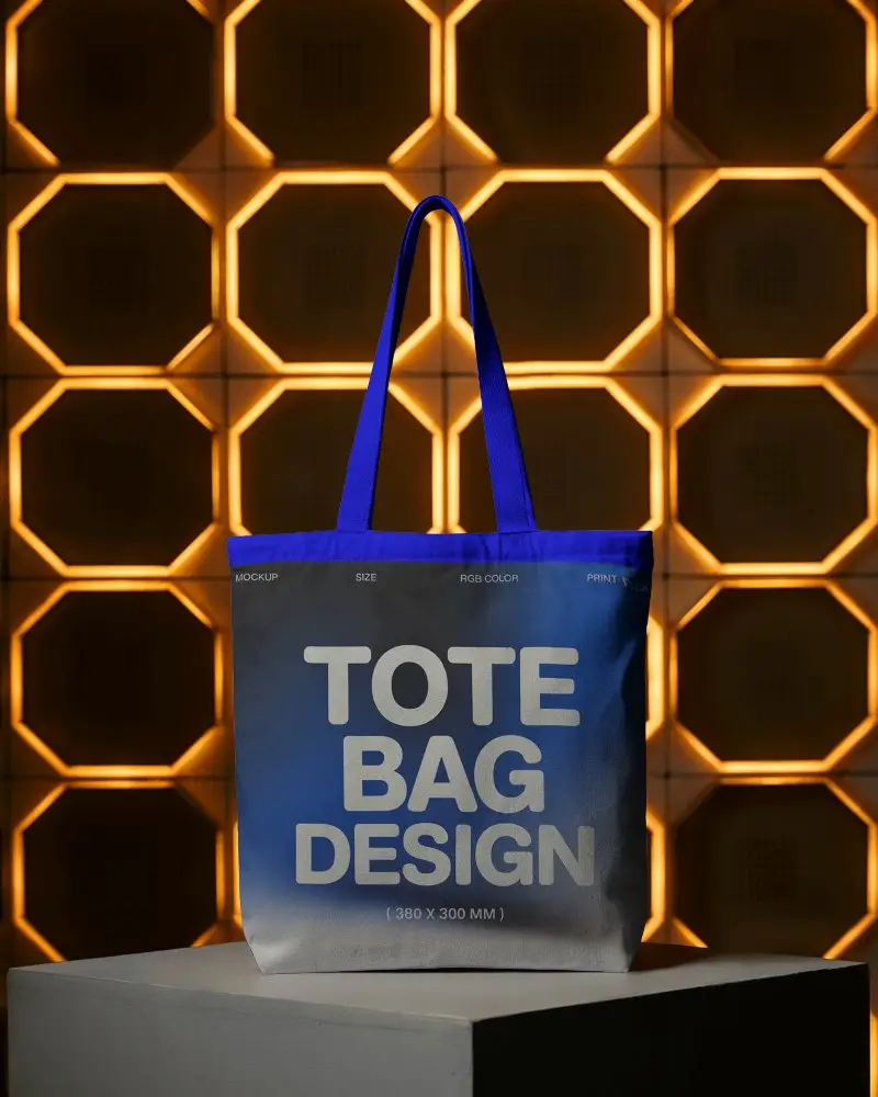 Tote Bag Mockup On Podium With Geometric Orange Backlit Wall Background