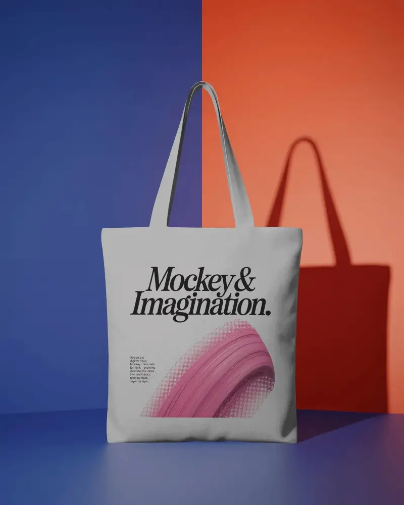Modern Studio Tote Bag Mockup On Bold Geometric Blue And Orange Background