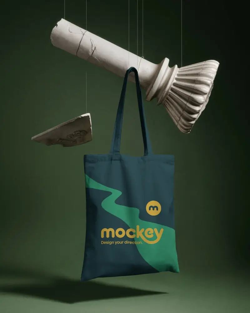 Suspended Tote Bag Mockup Cotton Fabric Bag Floating In Studio With Classical Sculpture Element
