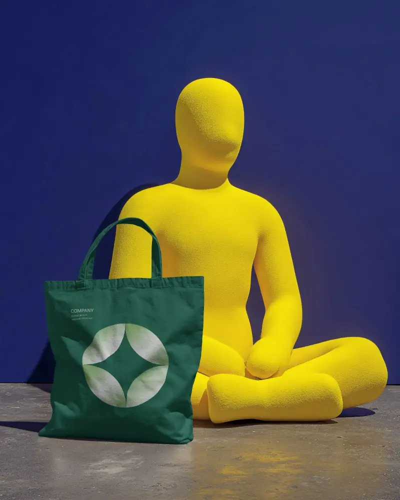Bold Color Totebag Mockup Canvas Bag With Yellow Mannequin Blue Studio Background