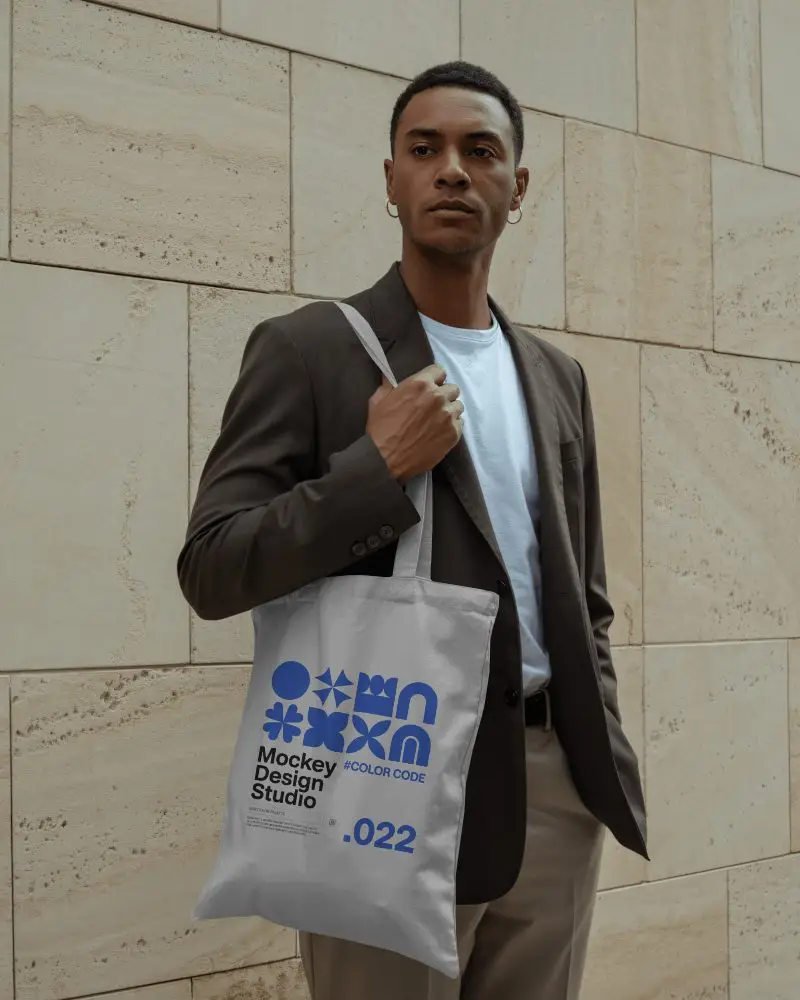Professional Lifestyle Totebag Mockup Canvas Bag Worn On Shoulder By Male Model