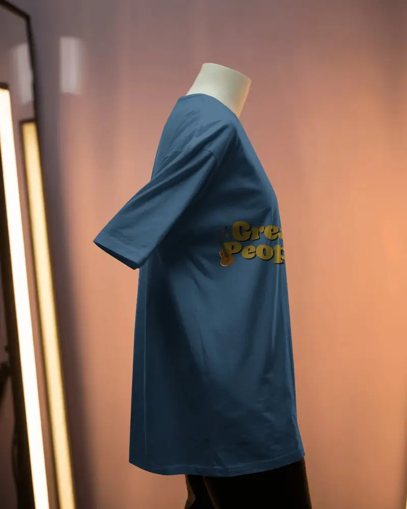 Side Profile Tshirt Mockup On Headless Mannequin Against Soft Pink Orange Gradient Backdrop And Studio Light