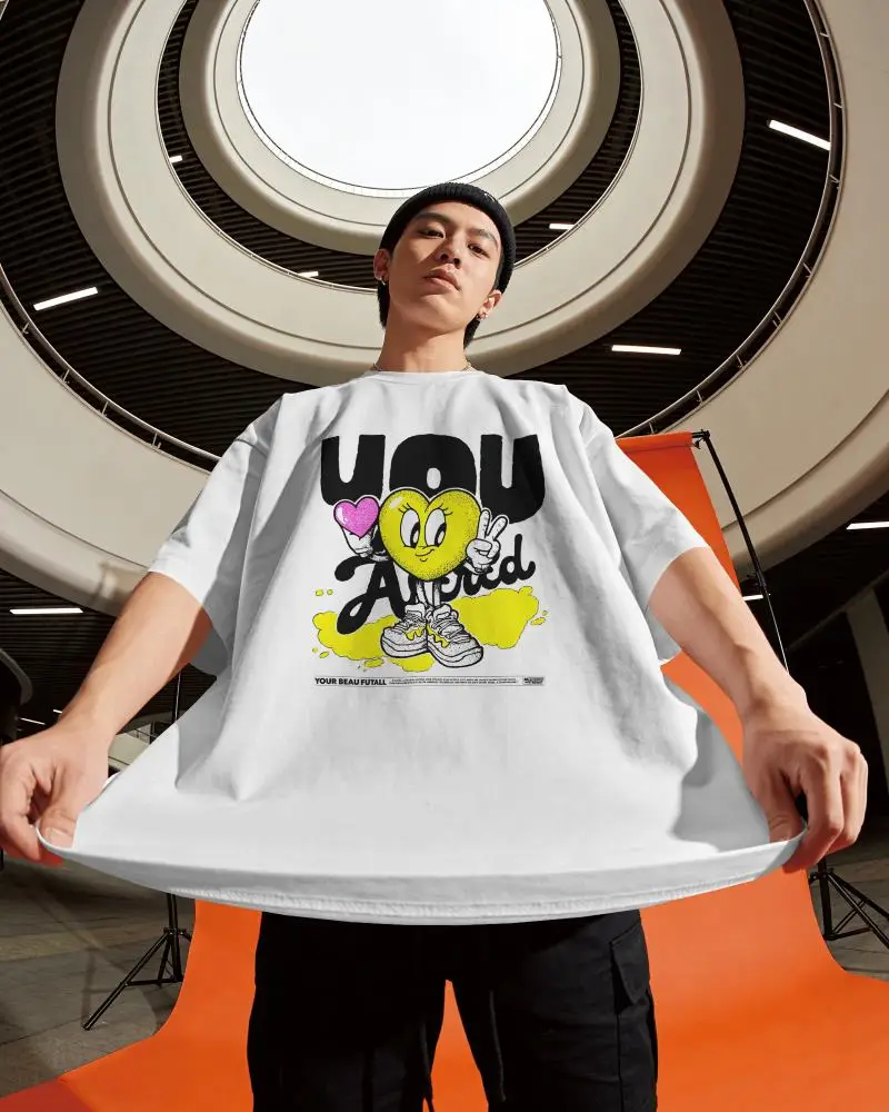 Low Angle T Shirt Mockup Male Model Pulling Fabric Wide Architectural Ceiling Background