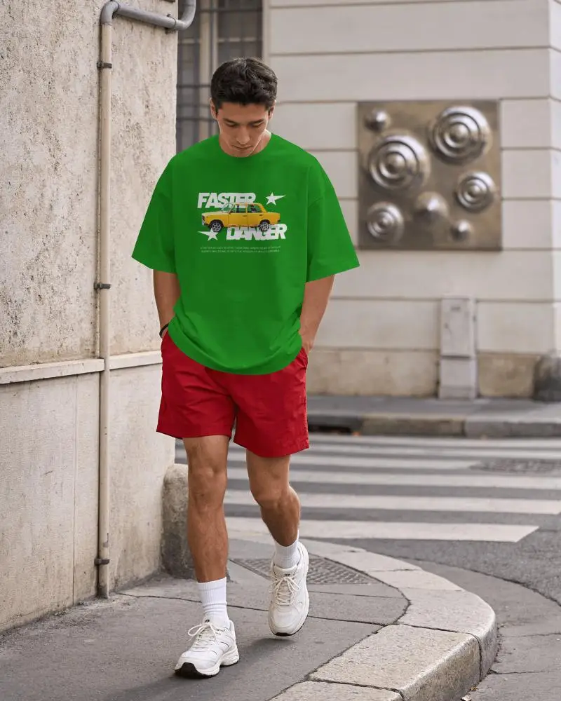 Streetwear T Shirt Mockup On Model Walking With Natural Daylight And Urban Background