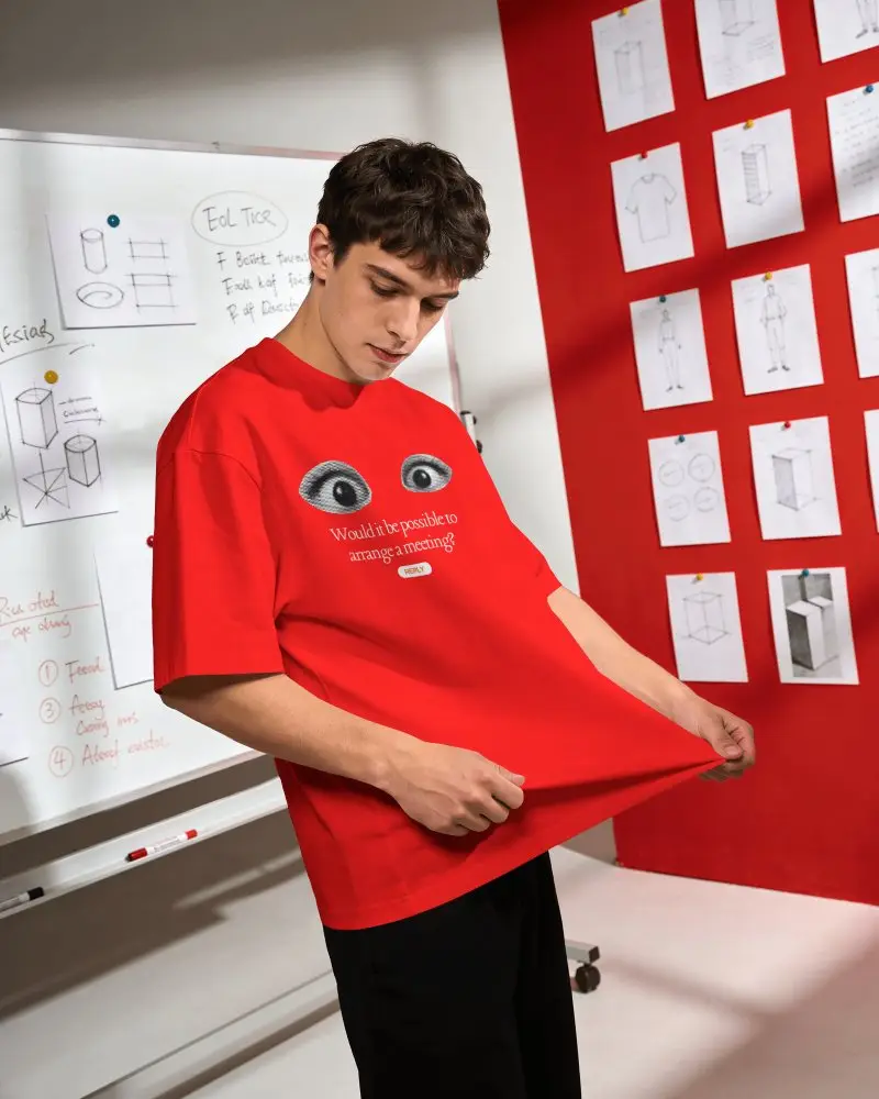 Studio T Shirt Mockup On Model With Fabric Stretch Action And Creative Workspace Background