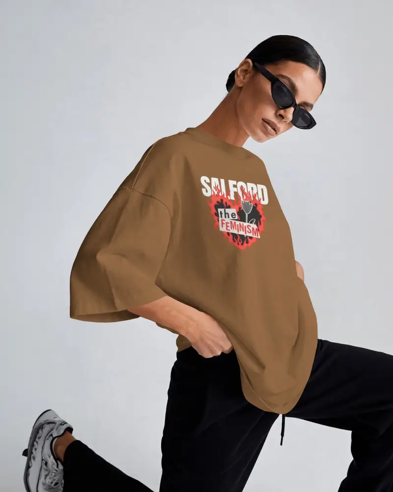 Fashion Oversized T Shirt Mockup On Model With Dynamic Pose And Clean Studio Background